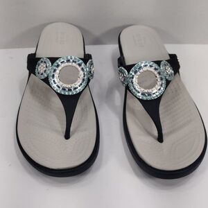 Crocs Elegant Black and Silver Women's  size 10w pre owned Exellent condition